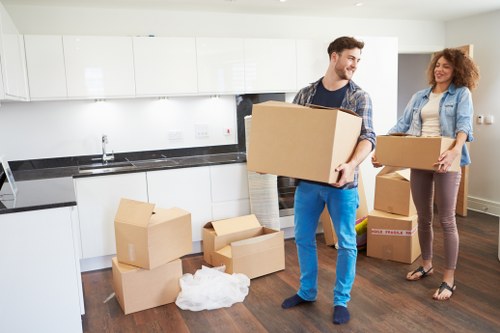 Removal crew transporting office items from a Cheam workplace