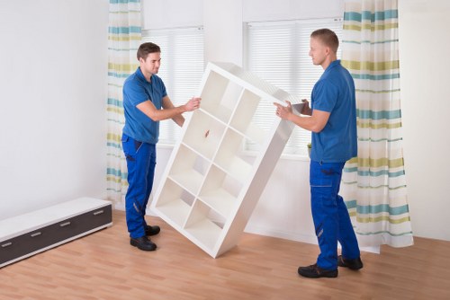 Packing and loading furniture into a van for a Cheam house move