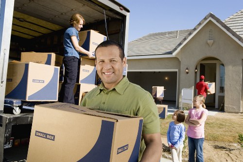 Careful transport of household items in a van around Cheam