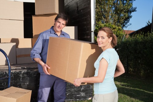 Business removals team loading furniture near Cheam premises